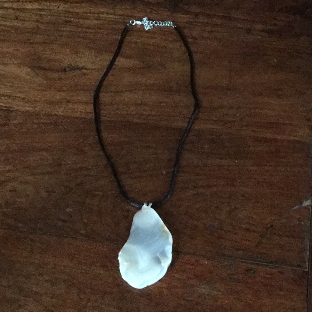 Ancient agate handcrafted necklace on 18 in cord.